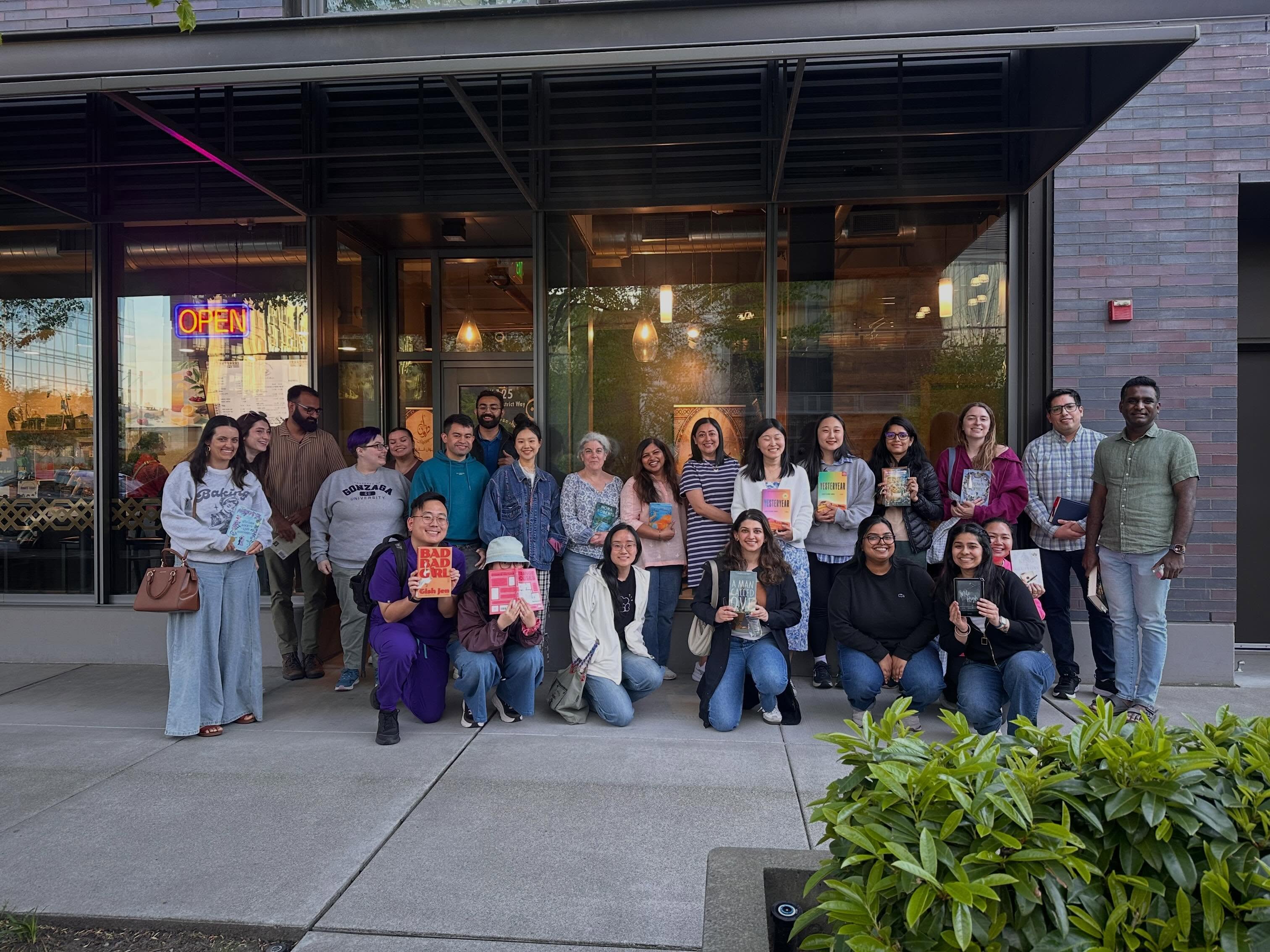 Community book club gathering outside Diwan